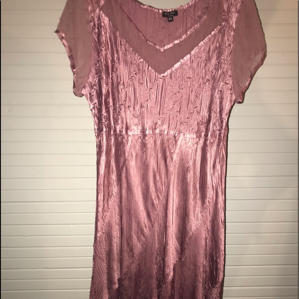 Komarove rose colored dress.